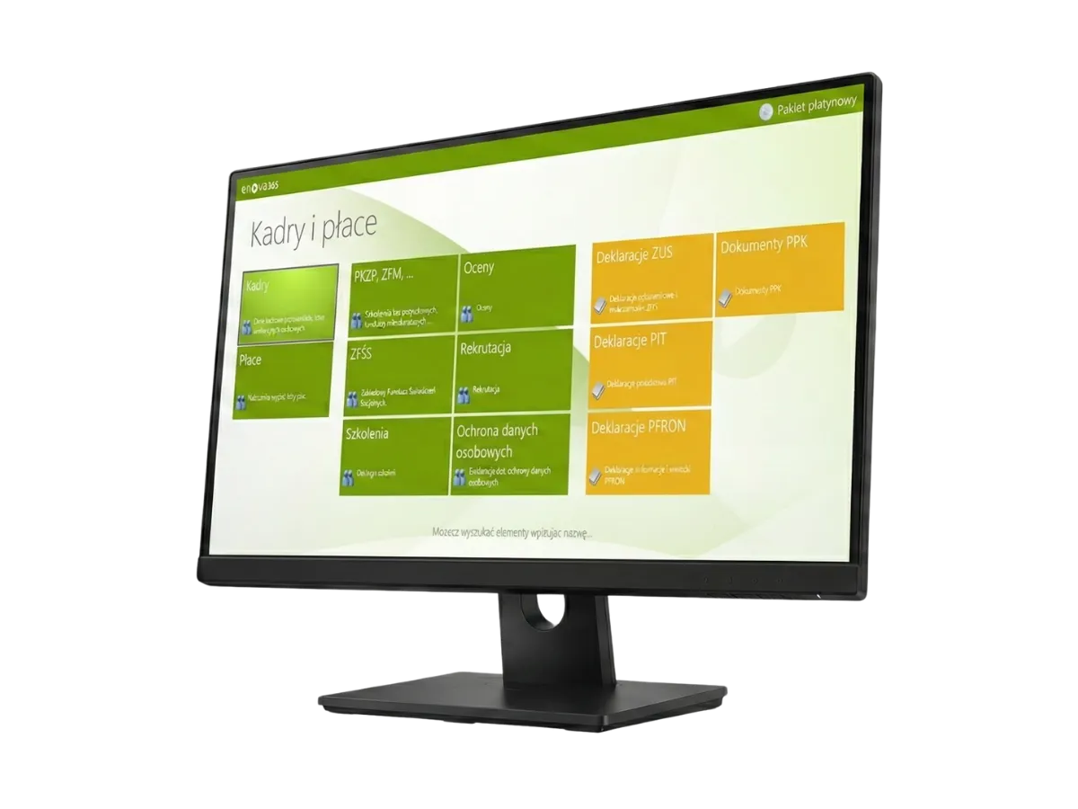 Czarny monitor komputerowy z włączonym ekranem, na którym widoczny jest kafelkowy interfejs modułu "Kadry i płace" systemu enova365.
